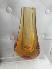 Amber glass vase is a
