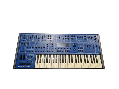 Oberheim synthesizer - -,