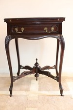 An Edwardian mahogany envelope card table by Allen & Appleyard