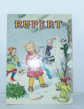 RUPERT BEAR ANNUAL 1990- RUPERT HAS A HAT & SCARF FOR THE SNOWMAN ON THE COVER