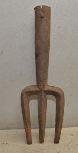 Antique cast iron potato - , fork