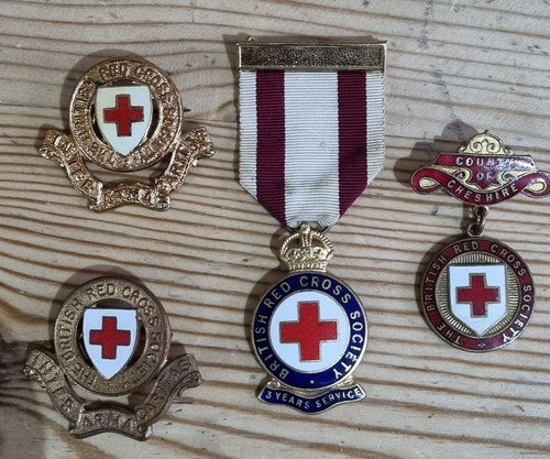Red cross badges and - and, pins