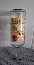 BROWN LABEL MARSTON THOMSON & EVERSHED P.L.C LARGE EMPTY SCOTCH WHISKY BOTTLE.