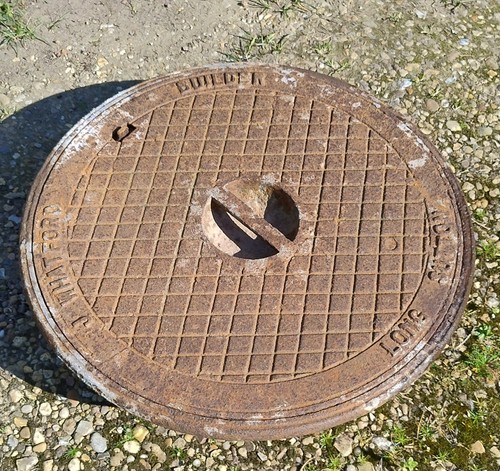 Old cast iron manhole - cast,