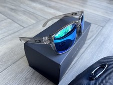 Oakley HOLBROOK  POLARIZED. Grey / semi-clear frame, light blue lenses