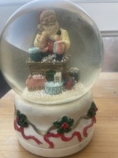 Vintage Santa Workshop Snow Globe with Toys – Christmas Holly Base Decoration