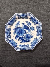 Royal Delft plate featuring a peacock design