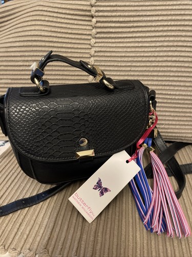 Bnwt black compact - bnwt,