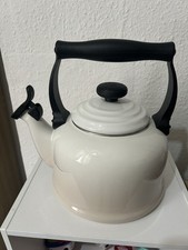 Cream Le Creuset Stove top