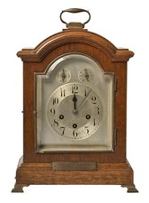 A German Oak Bracket Clock Early 20thC, with Arched Top Dial and Chapter Ring,