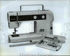 Undated Press Photo Elna Carina Sewing Machines features Swiss Sewing System.