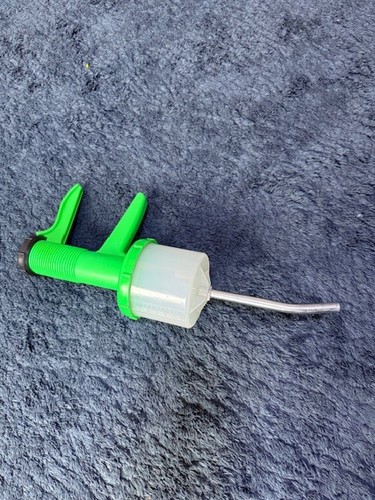 Plastic dose green syringe - plastic,