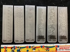 9 sizzix envelope flap  & embossing folders butterflies grass floral etc used