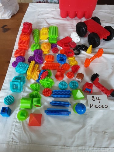 Red bucket with pieces - red, of
