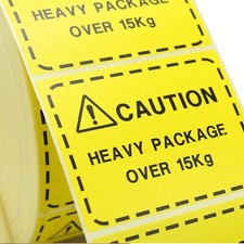 CAUTION HEAVY PACKAGE OVER