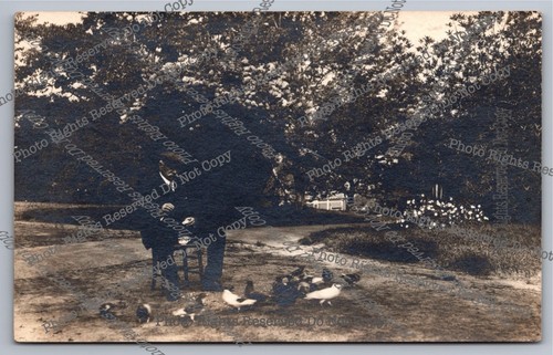 Antique rppc man sitting - man, on