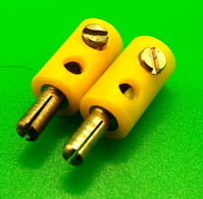 Two Meccano miniature plugs