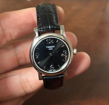tissot black leather 28mm