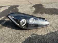 Hyundai Coupe driver headlight