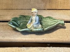 Vintage SHAMROCK POTTERY Figure on Green Leaf Ornament #AGT26