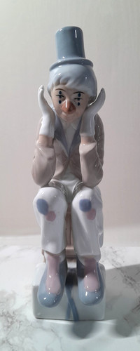 Casades seated sad clown - sad,