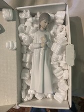 NAO 00562 Girl Holding Candle Porcelain Figurine by Lladro