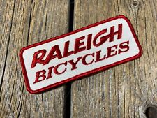 VINTAGE BIKE BICYCLE RALEIGH PATCH TRUCKER HAT BADGE APRON SHOP CREST EMBLEM NOS