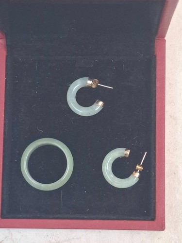Gold and jade earrings and