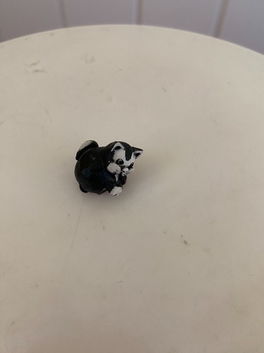 Tiny ceramic black white cat - black,