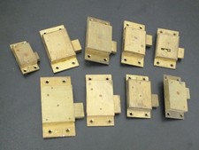 JOB LOT 9 VINTAGE BRASS CUPBOARD DOOR LOCKS FOR SPARES NO KEYS.