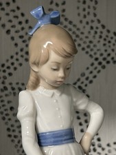 Porcelain figurine titled