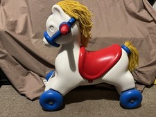1960s Child's ride on horse on wheels. Vintage toy made by Triang, Good conditio