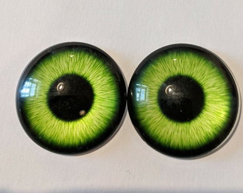 Green glass cabachon eyes with
