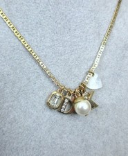 (D08) Dyrberg Core Gold Chain with Various Pendants approx. 60cm +5cm