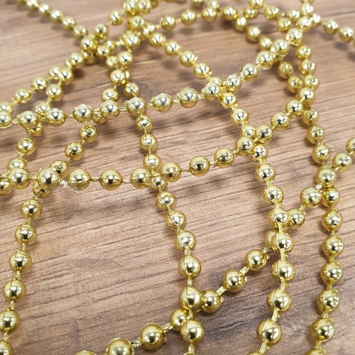 Metallic gold pearl bead - metallic,