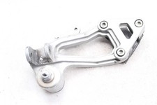 Footrest retaining plate rear