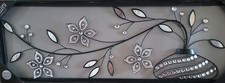 XL silver sparkly leaf wall art with Faux diamond detailing. 35" X 11".