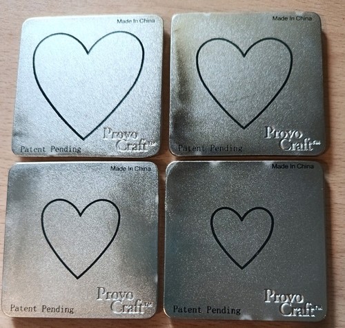 Cuttlebug hearts 2 die - x, 2"