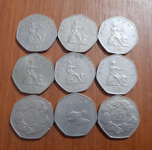Old large 50p coin - 9,