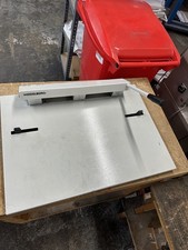 Heidelberg SM52 plate punch.