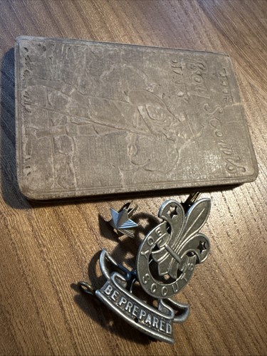 Scout badge and - and, note