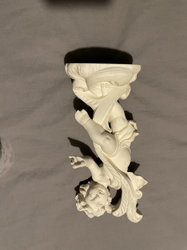 White alabaster cherub posing - alabaster,