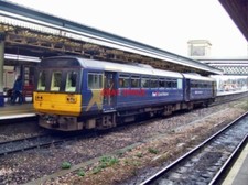 PHOTO  CLASS 142 PACER 2-CAR DMU NO 142 004 AT EXETER ST DAVIDS NEWLY TRANSFERRE