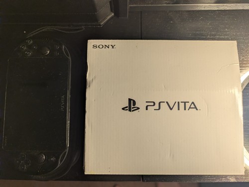 Vita with charging cable - ps,