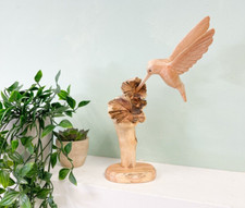 Wooden Hummingbird on Parasite