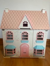 Pink Dollhouse, used, good condition, comes with furniture shown in photos.