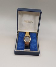 Rare Vintage SEIKO V701-6J00 Gold Tone Black Dial Mens Quartz Watch, 31 mm