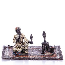 Colored Bronze Sculpture Viennese Style Arab Merchant on Carpet After Franz Bergman