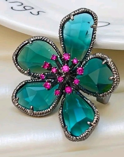 Green rhinestone flower brooch