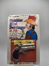 Vintage gambler, peg leg, Pete, solid, diecast, metal cap pistol with keychain